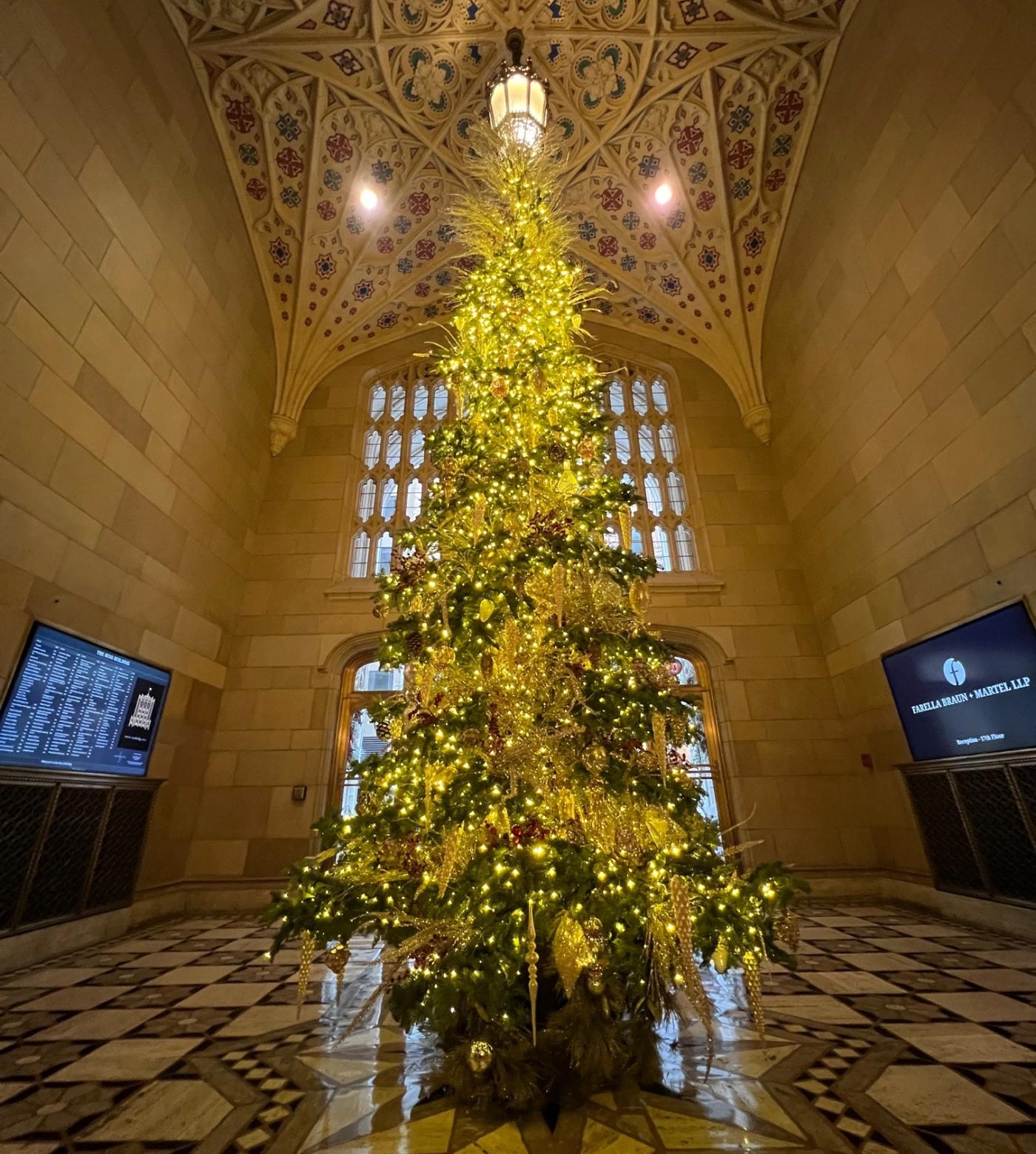 A decorated christmas tree in lobby of the Russ Building